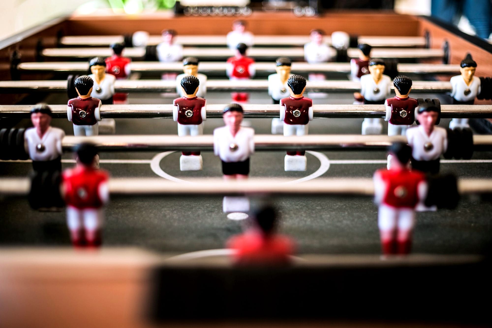 brown foosball table closeup photography