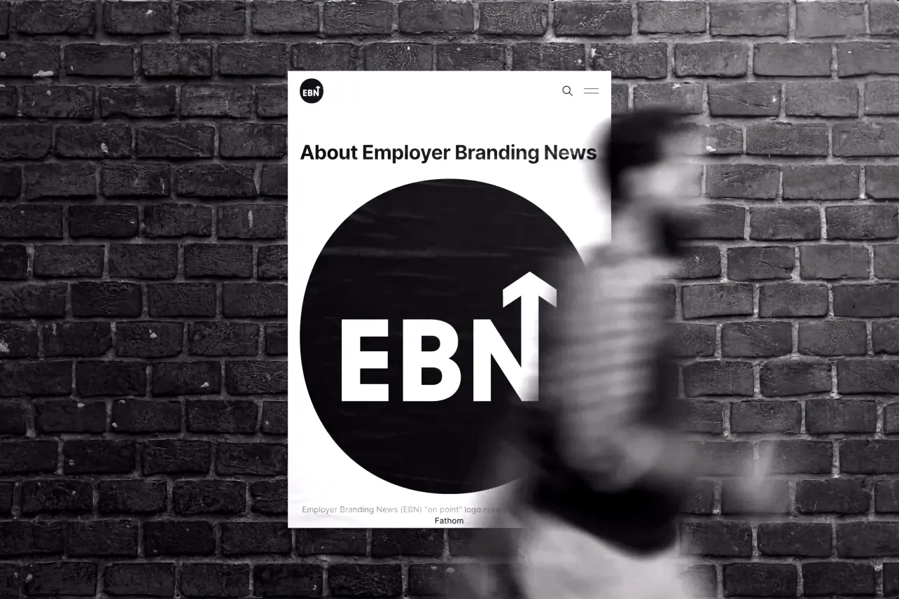 About Employer Branding News poster with EBN logo on a brick wall, blurred person walking past in the foreground.