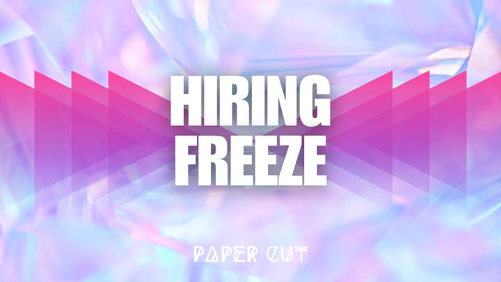 Hiring freeze! An icy, futuristic background emphasizes the slowdown in job openings and hiring freezes in major industries.